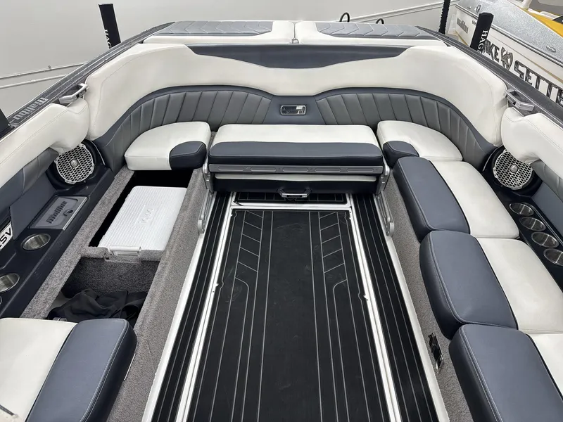 Slide: The Image of 2016 Malibu 25 LSV boat interior with spacious seating and modern design. - 15