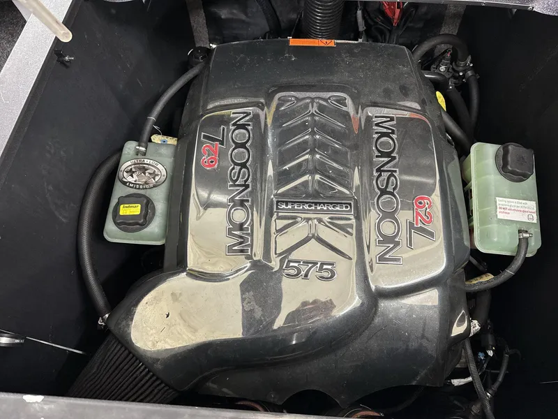 Slide: The Image of Supercharged Monsoon 575 engine in a 2016 Malibu 25 LSV boat. - 18
