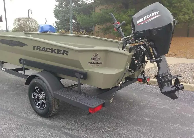 Slide: The Image of 2025 Tracker Grizzly 1650 T Prairie Wings Edition boat with Mercury outboard motor. - 4