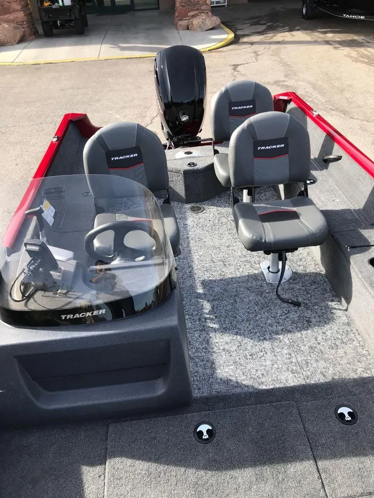 Slide: The Image of 2025 Tracker Pro Guide V-16 SC fishing boat with seating and steering console. - 10