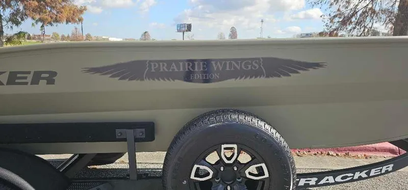 Slide: The Image of 2025 Tracker Grizzly 1650 T Prairie Wings Edition boat with custom trailer. - 2