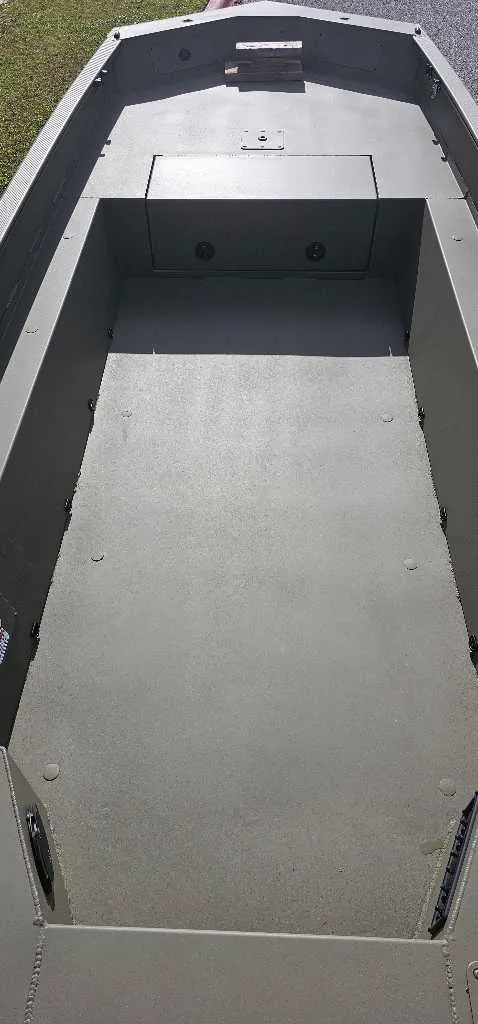 Slide: The Image of 2025 Tracker Grizzly 1650 T Prairie Wings Edition boat interior, spacious and durable design. - 3