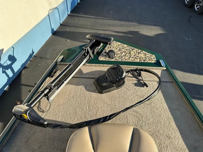 Slide: The Image of 2025 Tracker Bass Tracker Classic Limited boat deck with trolling motor. - 19