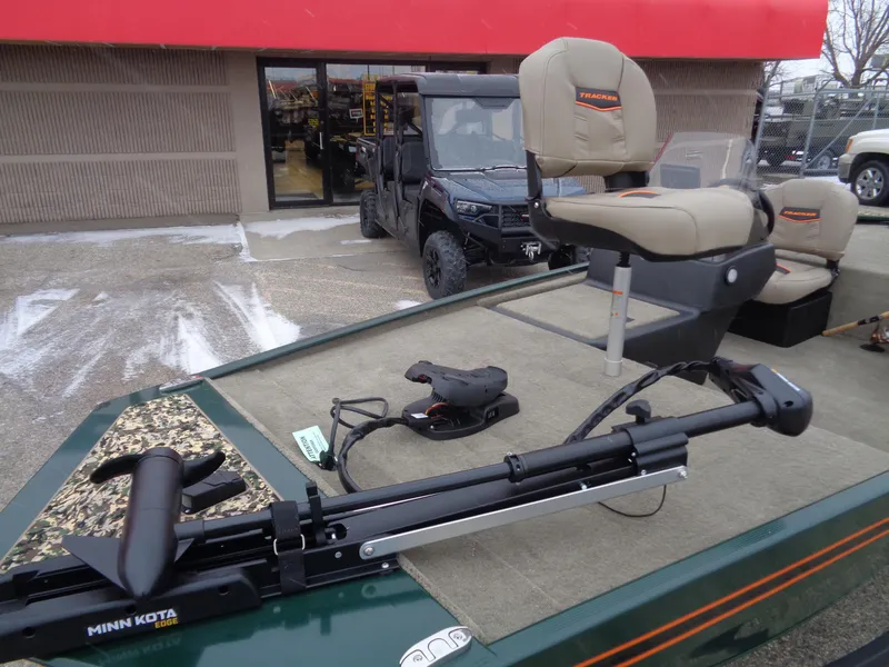 Slide: The Image of 2025 Tracker Bass Tracker Classic Limited boat with Minn Kota trolling motor. - 5