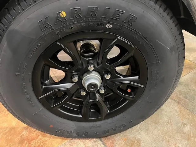 Slide: The Image of 2025 Tracker Bass Tracker Classic Limited black wheel with Karrie tire. - 12