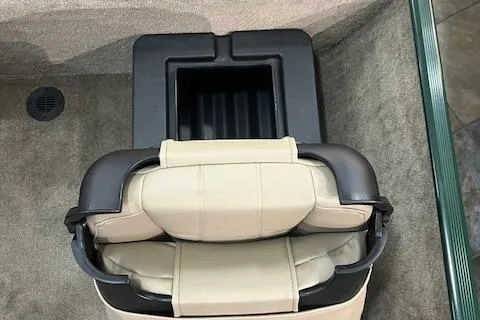 Slide: The Image of 2025 Tracker Bass Tracker Classic Limited boat seat and storage compartment. - 3