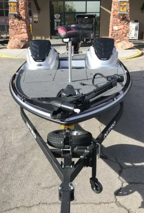 Slide: The Image of 2025 Nitro Z17 boat on trailer, parked outdoors, featuring sleek design and modern equipment. - 5