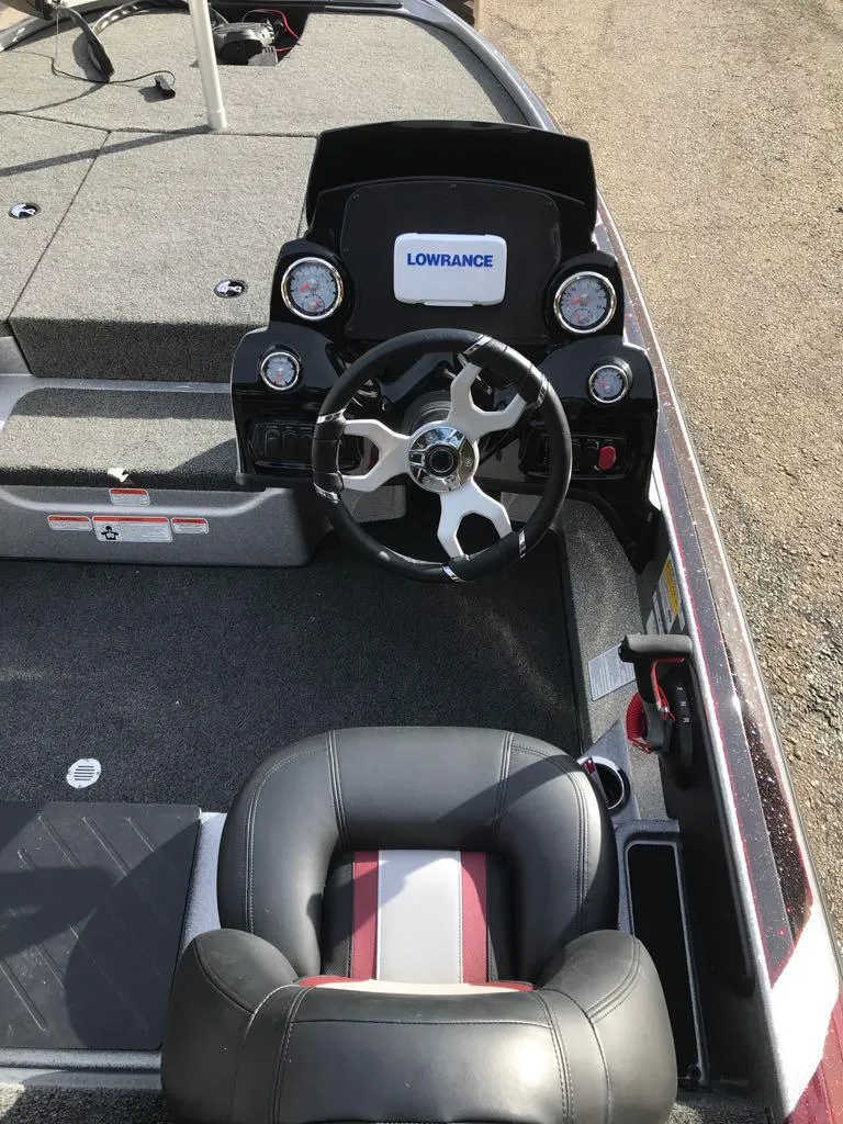 Slide: The Image of Nitro Z17 2025 boat dashboard with Lowrance system and steering wheel. - 7