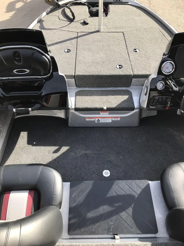 Slide: The Image of 2025 Nitro Z17 boat interior with dual seats and dashboard. - 8