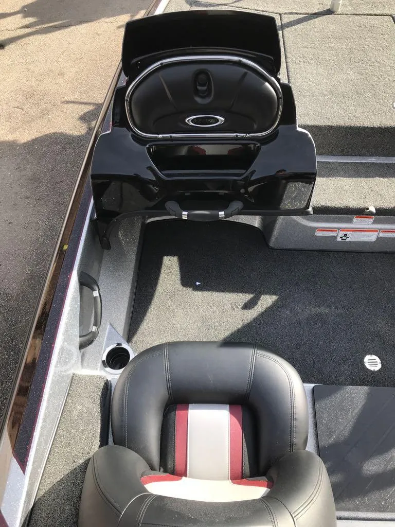 Slide: The Image of 2025 Nitro Z17 boat interior with black and red seating and storage compartments. - 9