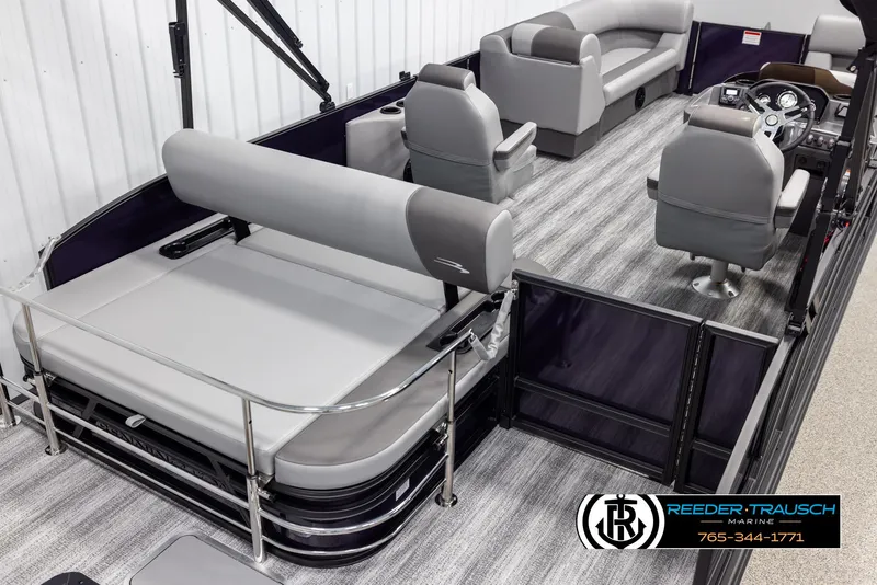 Slide: The Image of 2025 Bennington 23 SSBSE pontoon boat interior with gray seating and modern design. - 12