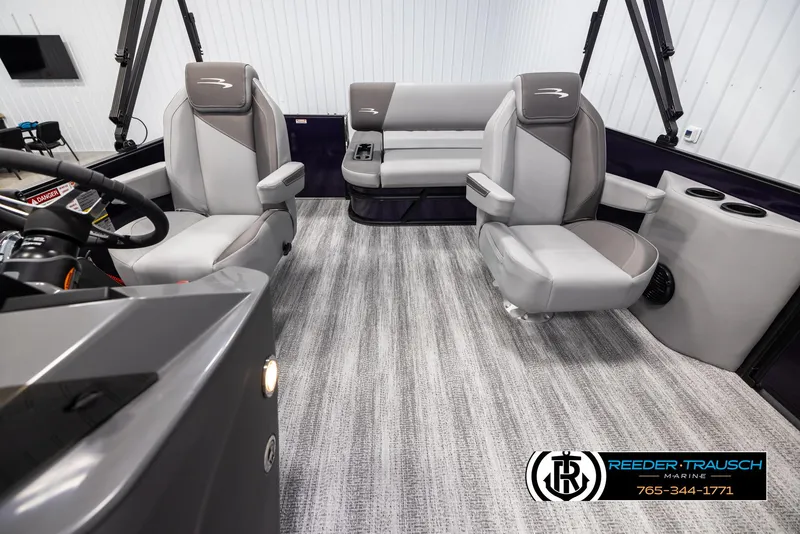 Slide: The Image of Interior of 2025 Bennington 23 SSBSE boat with modern seating and sleek design. - 14