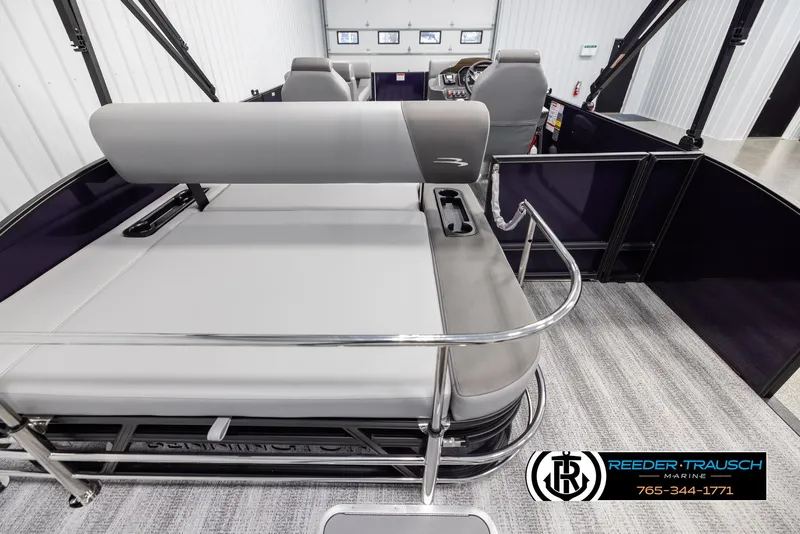 Slide: The Image of 2025 Bennington 23 SSBSE pontoon boat interior with seating and railing. - 16