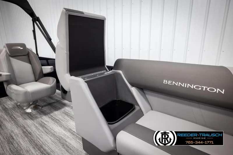 Slide: The Image of 2025 Bennington 23 SSBSE boat interior with seating and storage compartment. - 22