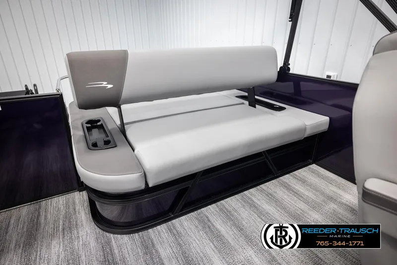 Slide: The Image of 2025 Bennington 23 SSBSE boat interior with gray seating and cup holders. - 23