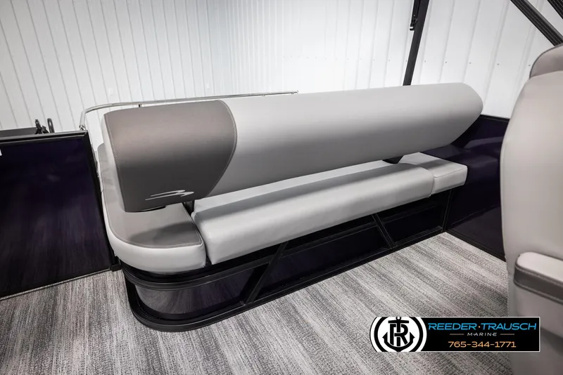 Slide: The Image of 2025 Bennington 23 SSBSE boat interior with sleek gray seating and modern design. - 24