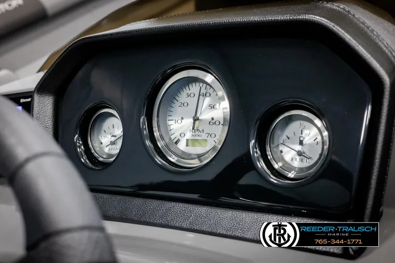Slide: The Image of Dashboard gauges of 2025 Bennington 23 SSBSE boat, featuring RPM and fuel indicators. - 32