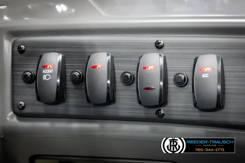 Slide: The Image of Control panel of 2025 Bennington 23 SSBSE with labeled switches and logo. - 33