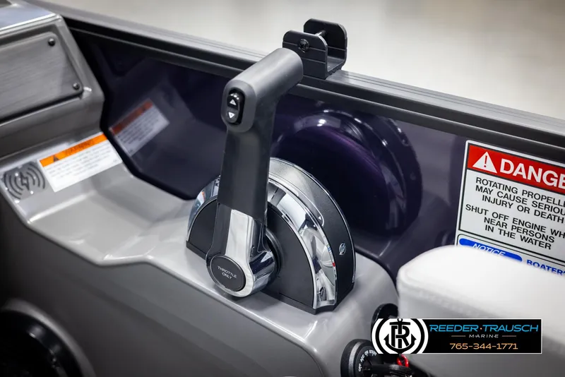 Slide: The Image of Throttle control of 2025 Bennington 23 SSBSE boat with safety warnings and branding. - 35