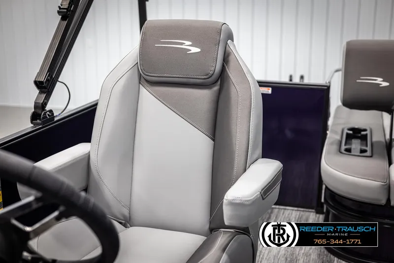 Slide: The Image of 2025 Bennington 23 SSBSE boat seats with logo, featuring premium gray upholstery. - 36