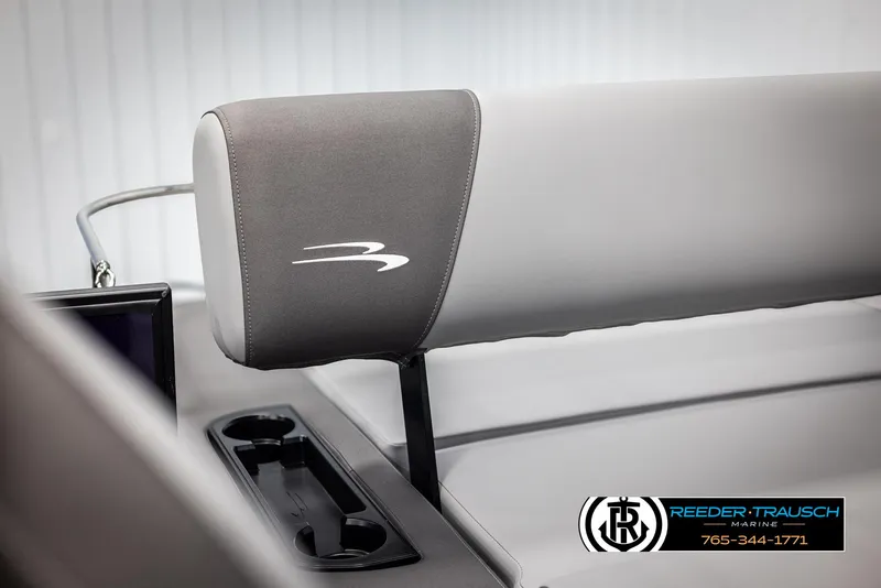 Slide: The Image of 2025 Bennington 23 SSBSE boat interior with logo and cup holders. - 41