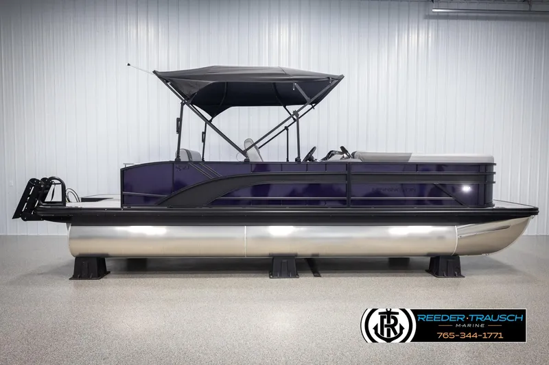 Slide: The Image of 2025 Bennington 23 SSBSE pontoon boat with canopy in showroom. - 5