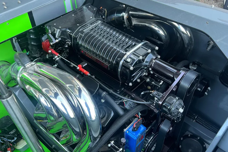 Slide: The Image of 2015 Daves Custom Boats M-29 engine with chrome components and supercharger. - 16