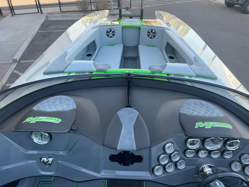 Slide: The Image of 2015 Daves Custom Boats M-29 interior with sleek dashboard and modern seating. - 7