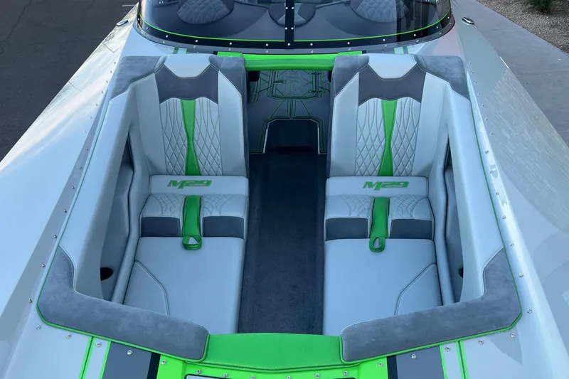 Slide: The Image of 2015 Daves Custom Boats M-29 interior with gray and green seating. - 8