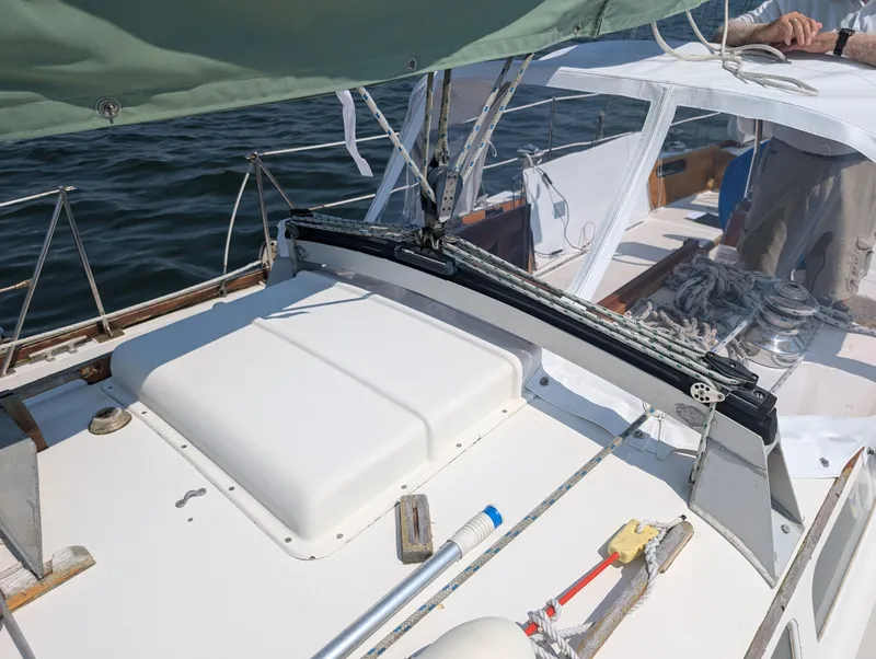 Slide: The Image of 1974 Hinckley Bermuda 40 Yawl sailboat deck with rigging and equipment. - 12