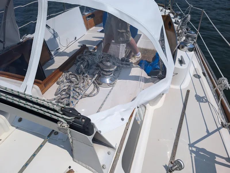 Slide: The Image of 1974 Hinckley Bermuda 40 Yawl deck with ropes and winches. - 20