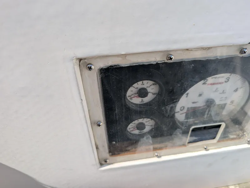 Slide: The Image of 1974 Hinckley Bermuda 40 Yawl dashboard with gauges and dials. - 22