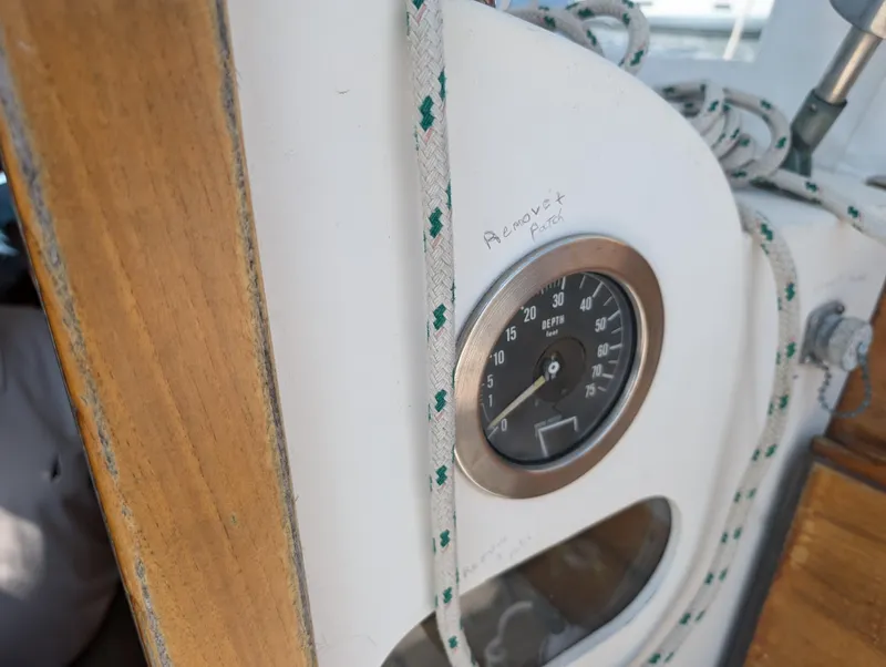 Slide: The Image of Hinckley Bermuda 40 Yawl 1974 cockpit detail with gauge and nautical rope. - 25