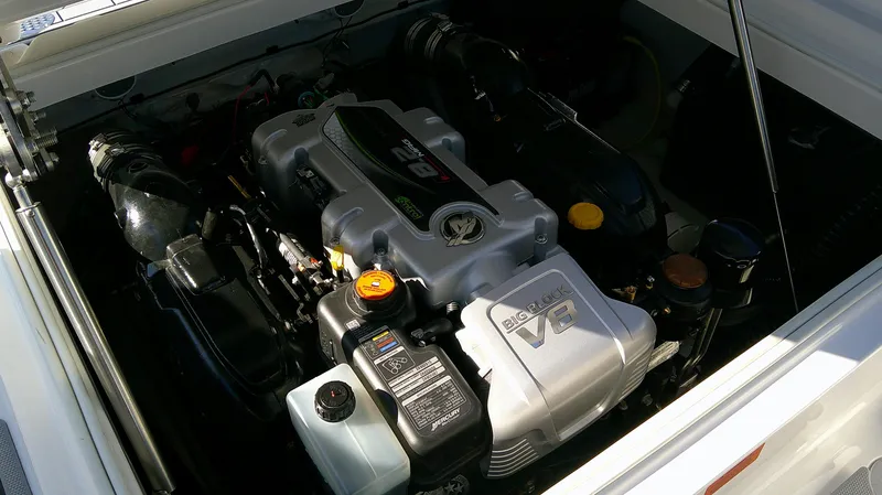 Slide: The Image of 2025 Chaparral 2870 SSX engine compartment showcasing a powerful V8 engine. - 13