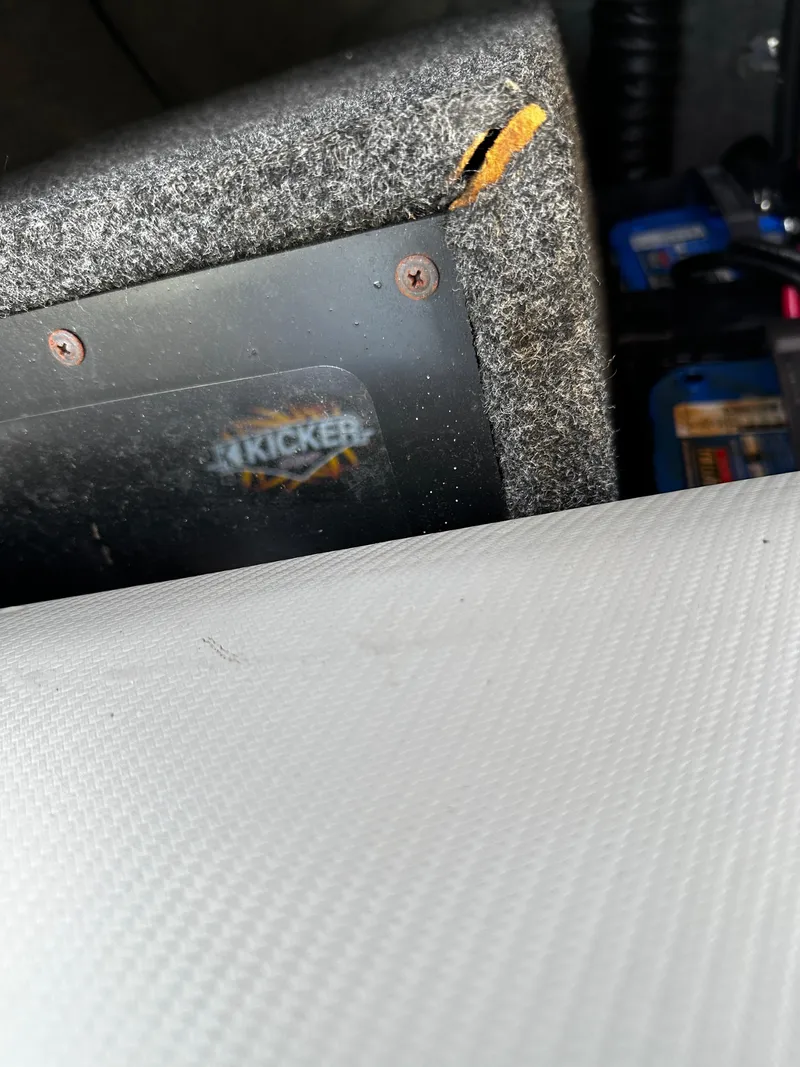 Slide: The Image of Close-up of a 2002 Malibu Wakesetter XTi interior with Kicker audio equipment. - 21