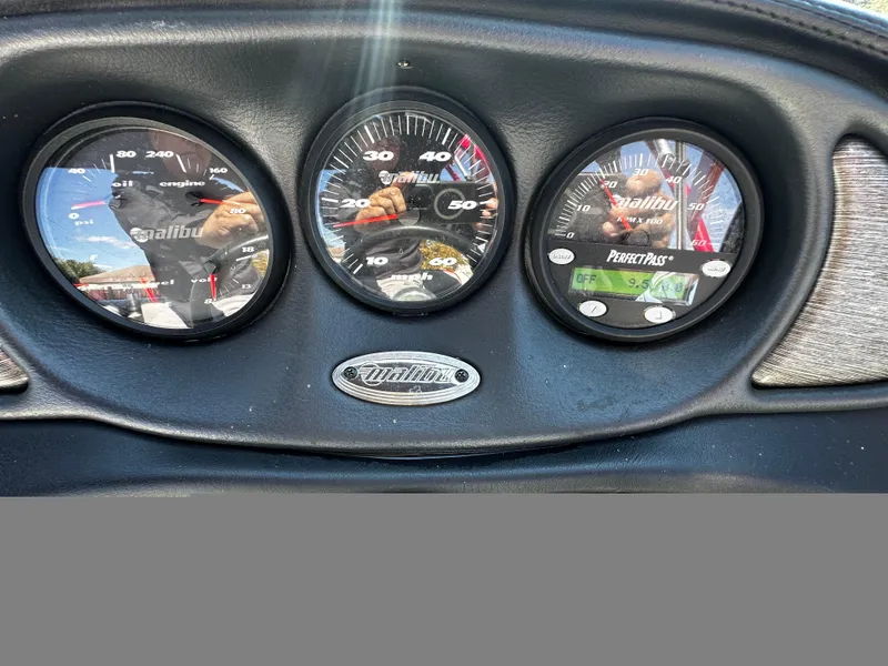 Slide: The Image of Dashboard of 2002 Malibu Wakesetter XTi boat with gauges and reflections. - 7