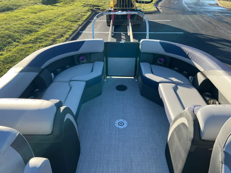 Slide: The Image of 2025 South Bay 224 RS Performance Package boat interior with plush seating and modern design. - 13