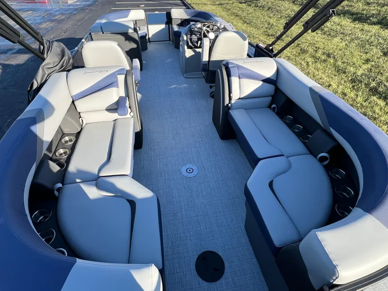 Slide: The Image of 2025 South Bay 224 RS Performance Package pontoon boat interior with spacious seating. - 15