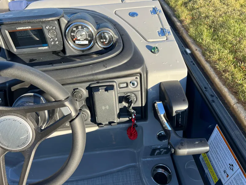 Slide: The Image of 2025 South Bay 224 RS Performance Package dashboard with steering wheel and controls. - 19