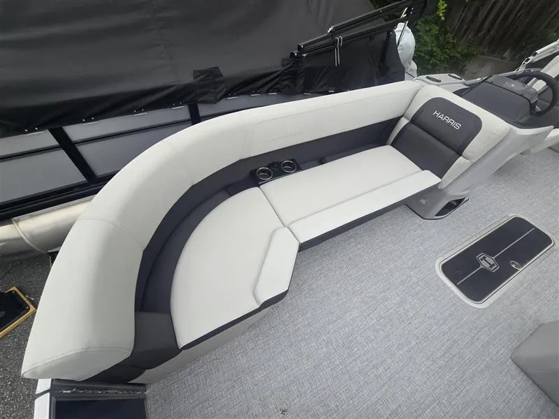 Slide: The Image of 2025 Harris Cruiser 230 boat interior with sleek seating and modern design. - 8
