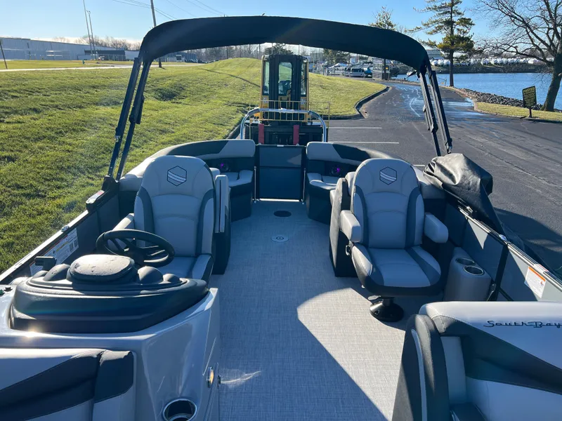 Slide: The Image of 2025 South Bay 222 RS pontoon boat with spacious seating and modern design. - 11