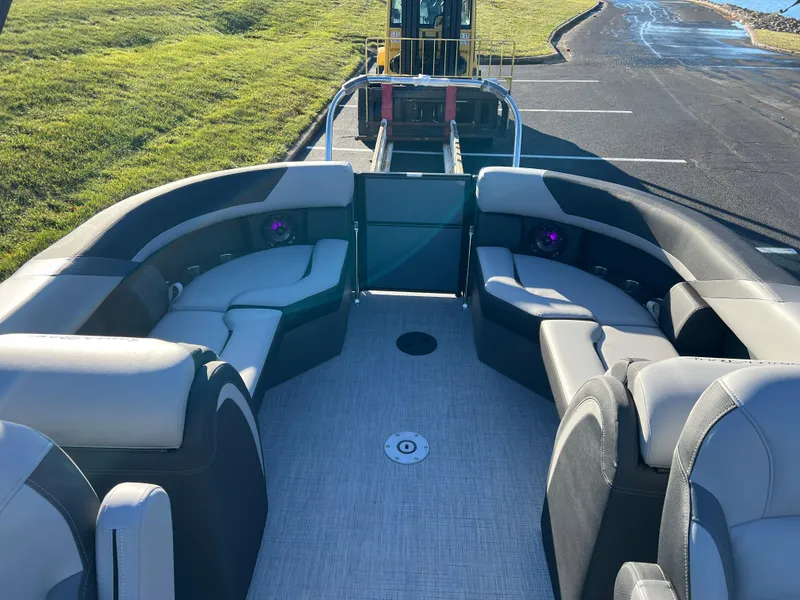 Slide: The Image of 2025 South Bay 222 RS pontoon boat interior with plush seating and modern design. - 13