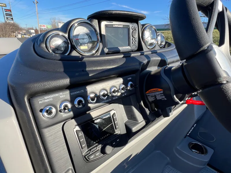 Slide: The Image of Dashboard of 2025 South Bay 222 RS boat with gauges and controls. - 20