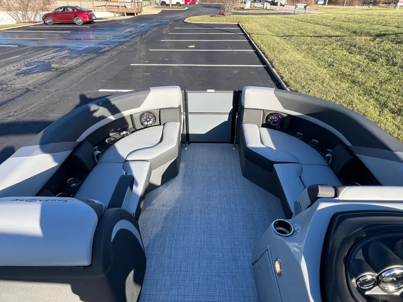 Slide: The Image of 2025 South Bay 222 RS pontoon boat interior with gray seating and modern design. - 22