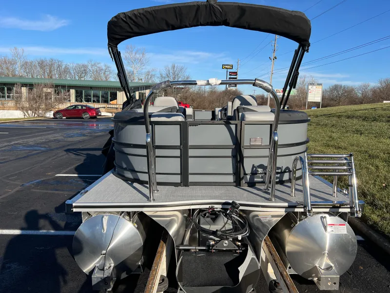 Slide: The Image of 2025 South Bay 222 RS pontoon boat in parking lot, rear view. - 6