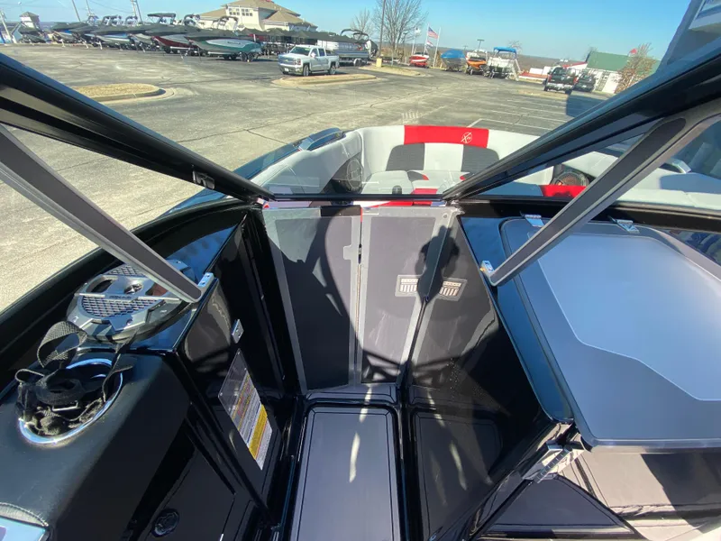 Slide: The Image of 2021 MasterCraft X26 boat interior with sleek design and modern features. - 32