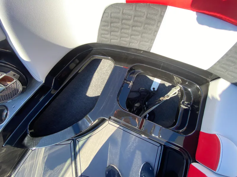 Slide: The Image of Interior of 2021 MasterCraft X26 boat showing seating and storage compartment. - 39