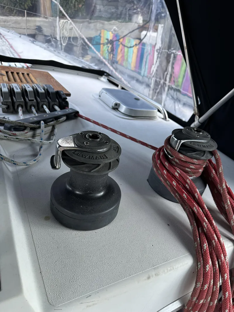 Slide: The Image of Deck of 1989 Canadian Sailcraft CS40 with winches and ropes. - 31