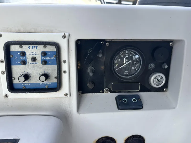 Slide: The Image of Control panel of a 1989 Canadian Sailcraft CS40 sailboat, featuring navigation instruments. - 43