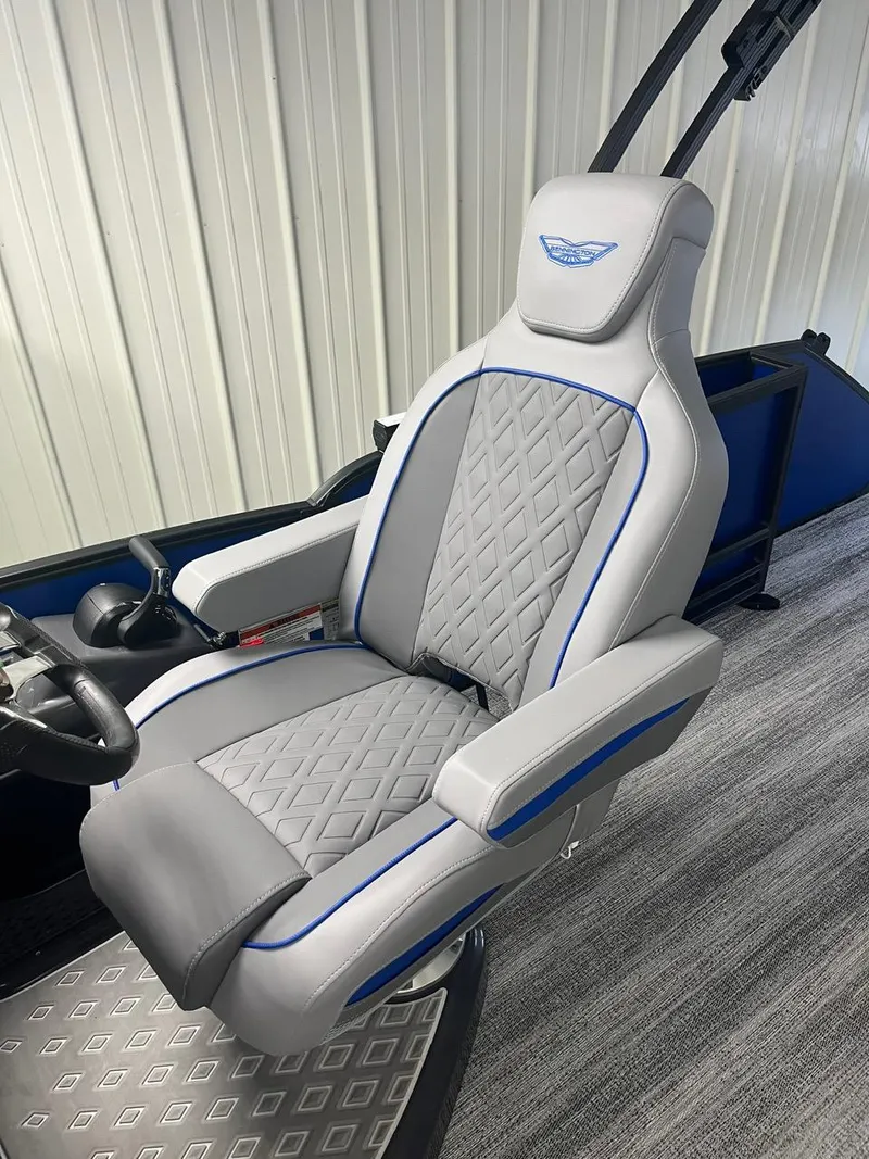 Slide: The Image of 2025 Bennington 24 MSB boat seat with gray and blue diamond-patterned upholstery. - 10